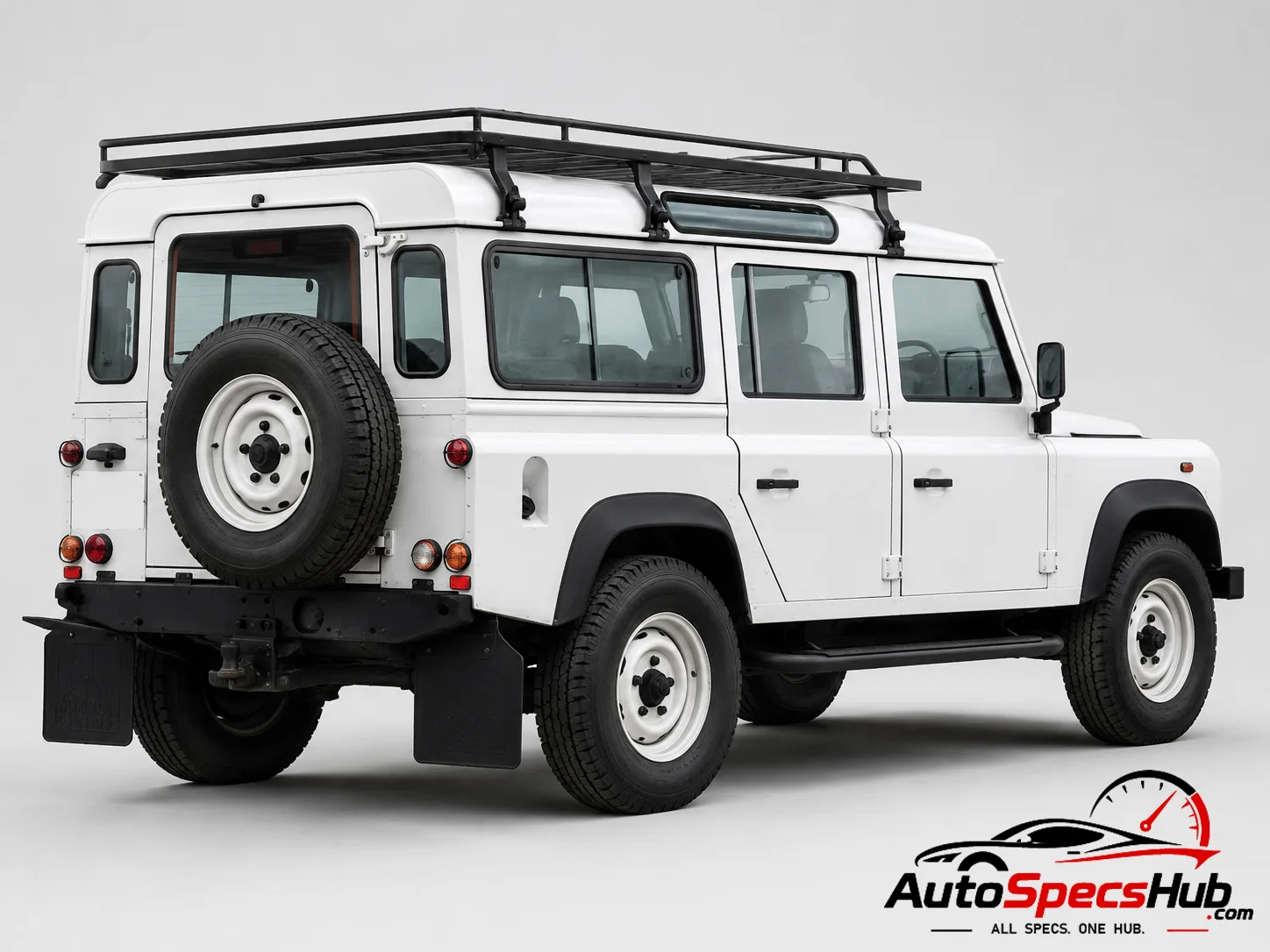 1999 Land Rover Defender 110 Td5 Station Wagon rear three-quarter view