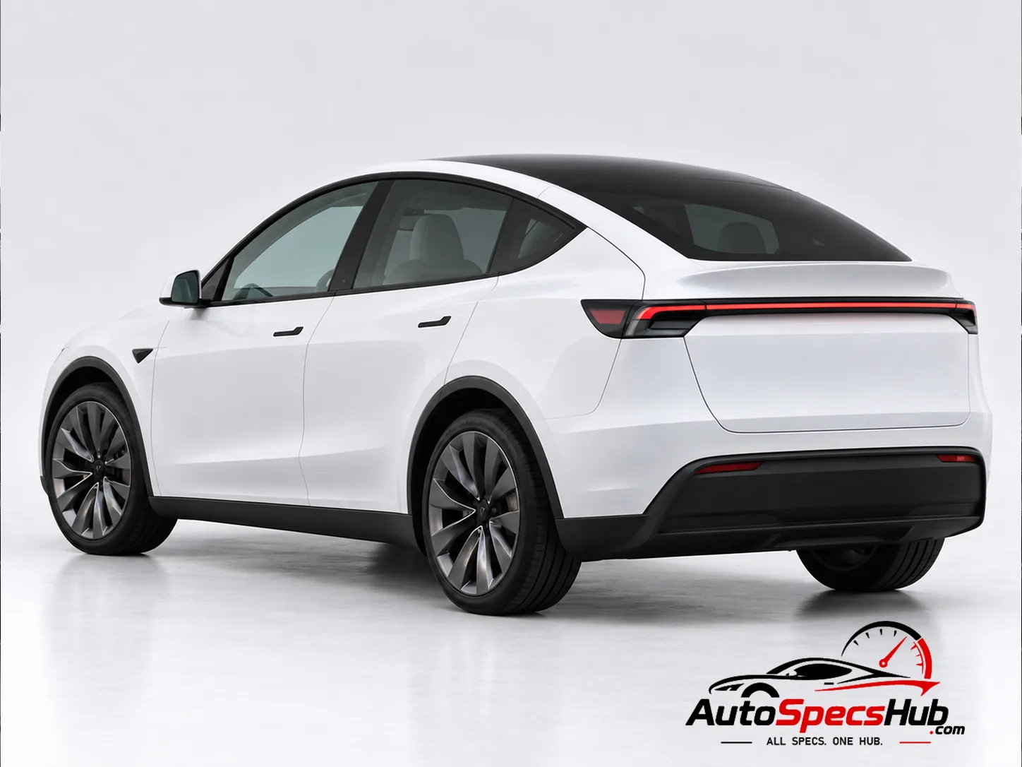 2025 Tesla Model Y RWD rear three-quarter view
